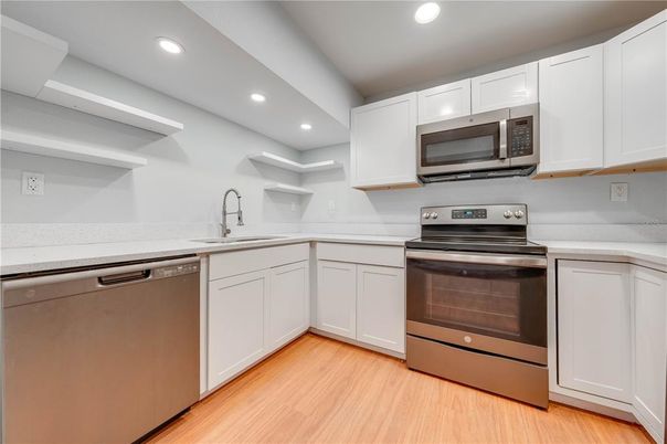 Interior, Kitchen, Recessed Lighting, Stainless Steel Appliances, Wood Texture Flooring