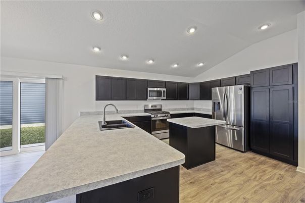 Interior, Kitchen, Recessed Lighting, Stainless Steel Appliances, Wood Texture Flooring
