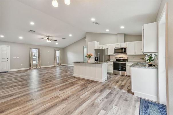 Interior, Kitchen, Recessed Lighting, Stainless Steel Appliances, Wood Texture Flooring