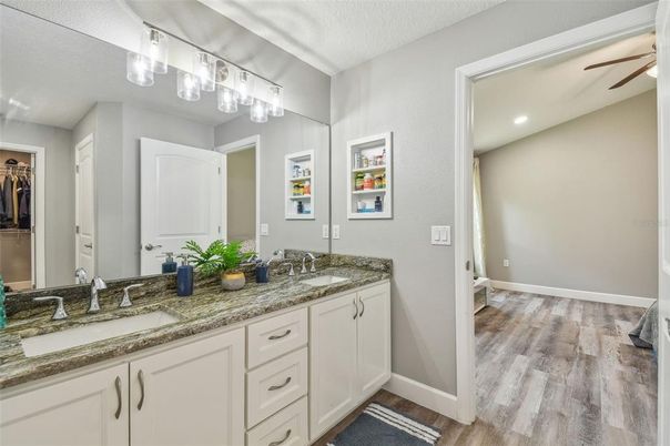 Bathroom, Dual Sink Vanities, Interior, Recessed Lighting, Wood Texture Flooring