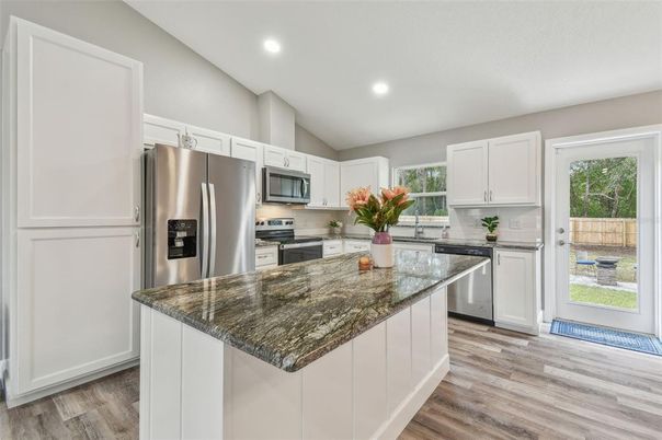 Interior, Kitchen, Recessed Lighting, Stainless Steel Appliances, Wood Texture Flooring