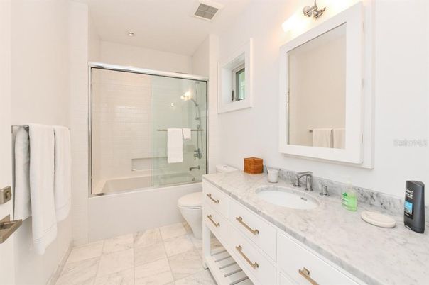 Bathroom, Dual Sink Vanities, Glass Shower, Interior, Marble, Recessed Lighting