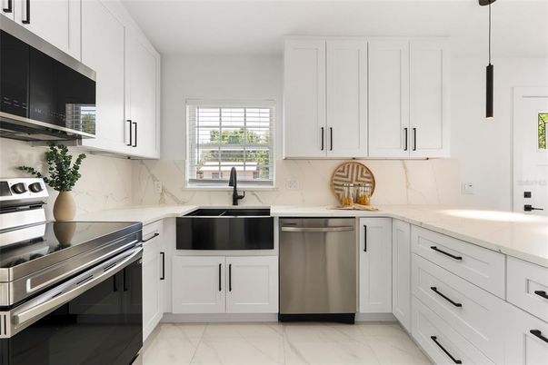 Interior, Kitchen, Marble, Marble Walls, Pendant Lights, Stainless Steel Appliances