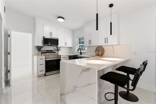 Interior, Kitchen, Marble, Pendant Lights, Stainless Steel Appliances