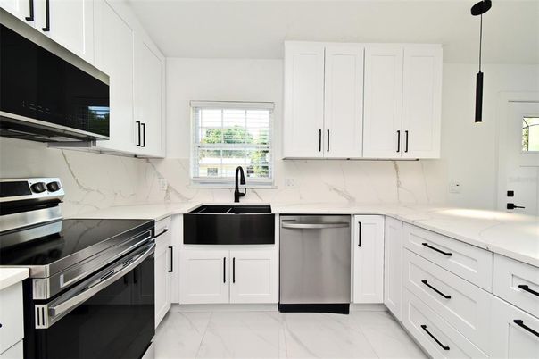 Interior, Kitchen, Marble, Marble Walls, Pendant Lights, Stainless Steel Appliances