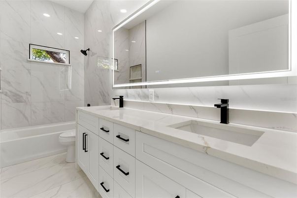 Bathroom, Dual Sink Vanities, Interior, Marble, Marble Walls, Recessed Lighting