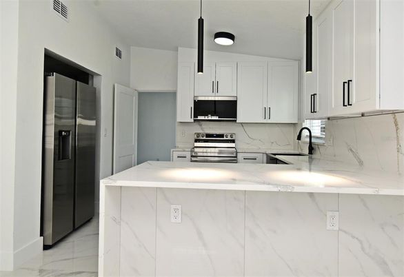 Interior, Kitchen, Marble, Marble Walls, Stainless Steel Appliances
