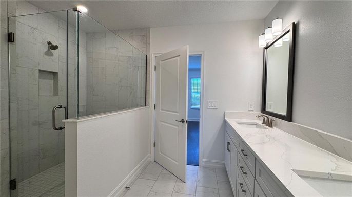 Bathroom, Dual Sink Vanities, Glass Shower, Interior, Marble, Marble Walls