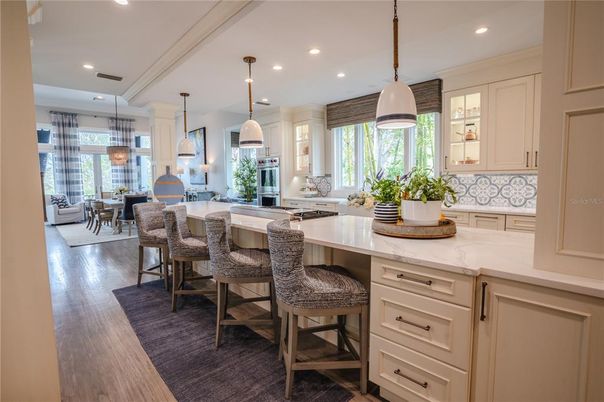 Dining room, Interior, Kitchen, Pendant Lights, Recessed Lighting, Stainless Steel Appliances, Wood Texture Flooring