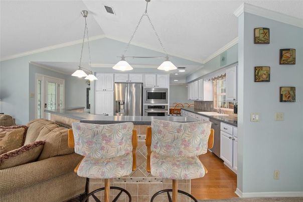 Interior, Kitchen, Pendant Lights, Recessed Lighting, Stainless Steel Appliances, Wood Texture Flooring