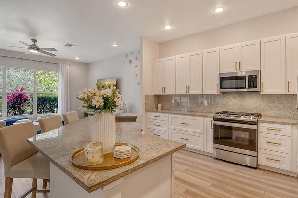 Dining room, Interior, Kitchen, Recessed Lighting, Stainless Steel Appliances, Wood Texture Flooring