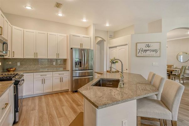 Dining room, Interior, Kitchen, Recessed Lighting, Stainless Steel Appliances, Wood Texture Flooring