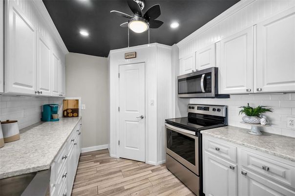 Interior, Kitchen, Recessed Lighting, Stainless Steel Appliances, Wood Texture Flooring