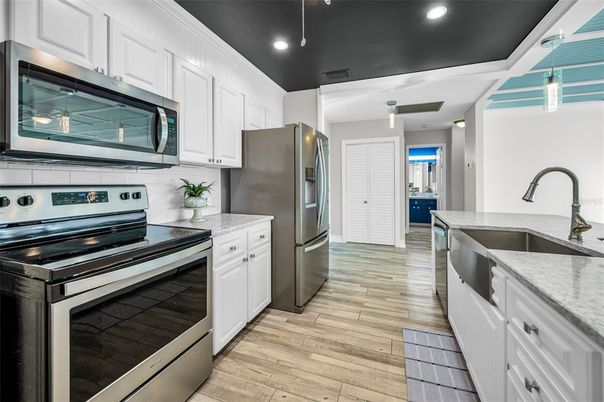 Interior, Kitchen, Pendant Lights, Recessed Lighting, Stainless Steel Appliances, Wood Texture Flooring