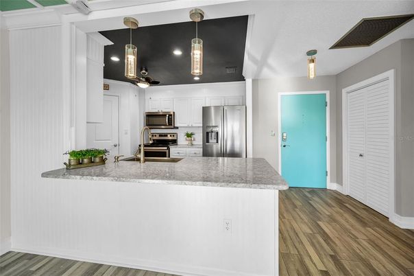 Interior, Kitchen, Pendant Lights, Recessed Lighting, Stainless Steel Appliances, Wood Texture Flooring