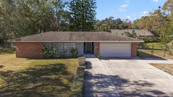 Attached, Backyard, Exterior, Facade, Brick Facade, Ranch