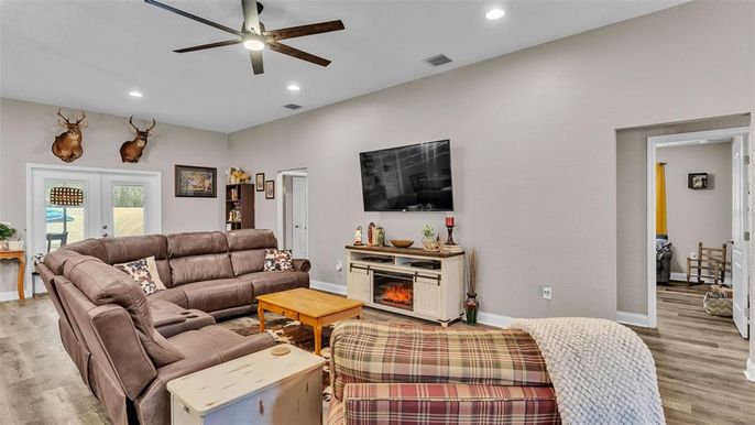 Fireplace, Interior, Living room, Recessed Lighting, Wood Texture Flooring