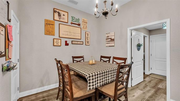 Chandelier, Dining room, Interior, Wood Texture Flooring
