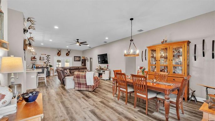 Chandelier, Dining room, Interior, Living room, Pendant Lights, Recessed Lighting, Wood Texture Flooring