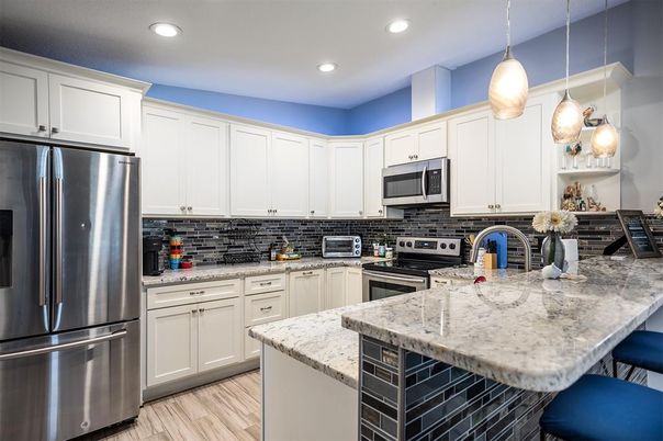 Interior, Kitchen, Pendant Lights, Recessed Lighting, Stainless Steel Appliances, Wood Texture Flooring