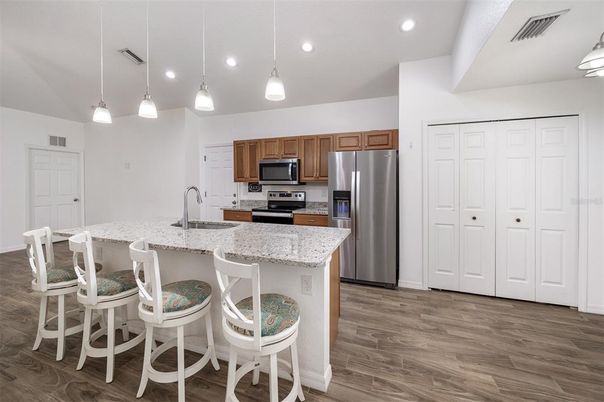 Interior, Kitchen, Pendant Lights, Recessed Lighting, Stainless Steel Appliances, Wood Texture Flooring