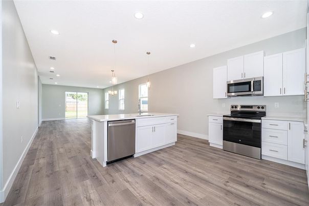 Interior, Kitchen, Pendant Lights, Recessed Lighting, Stainless Steel Appliances, Wood Texture Flooring