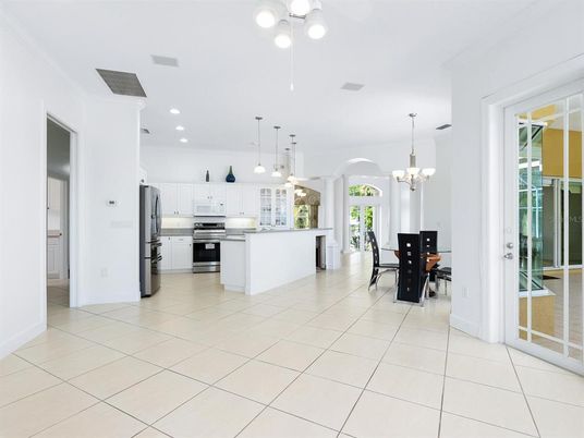 Chandelier, Dining room, Interior, Kitchen, Pendant Lights, Recessed Lighting, Stainless Steel Appliances