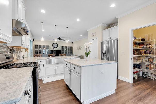 Interior, Kitchen, Pendant Lights, Recessed Lighting, Stainless Steel Appliances, Wood Texture Flooring