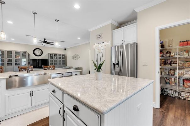 Dining room, Interior, Kitchen, Pendant Lights, Recessed Lighting, Stainless Steel Appliances, Wood Texture Flooring