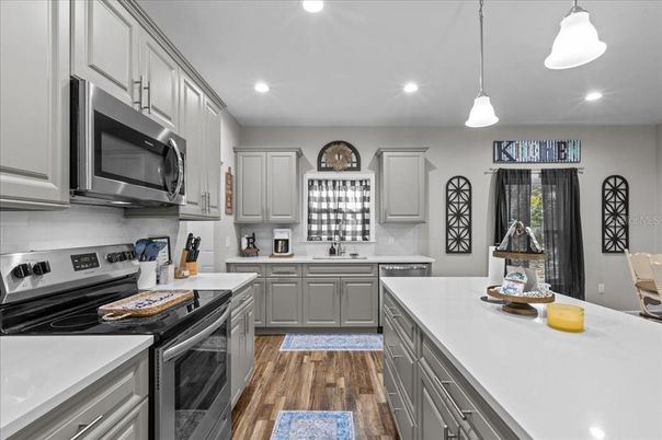 Interior, Kitchen, Pendant Lights, Recessed Lighting, Stainless Steel Appliances, Wood Texture Flooring