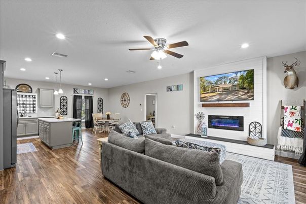 Dining room, Fireplace, Interior, Kitchen, Living room, Pendant Lights, Recessed Lighting, Wood Texture Flooring