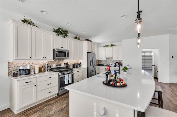 Interior, Kitchen, Pendant Lights, Recessed Lighting, Stainless Steel Appliances, Wood Texture Flooring