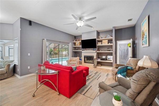 Fireplace, Interior, Living room, Recessed Lighting, Wood Texture Flooring