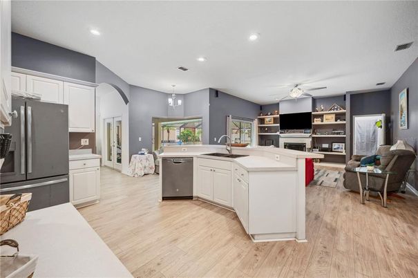 Interior, Kitchen, Pendant Lights, Recessed Lighting, Stainless Steel Appliances, Wood Texture Flooring