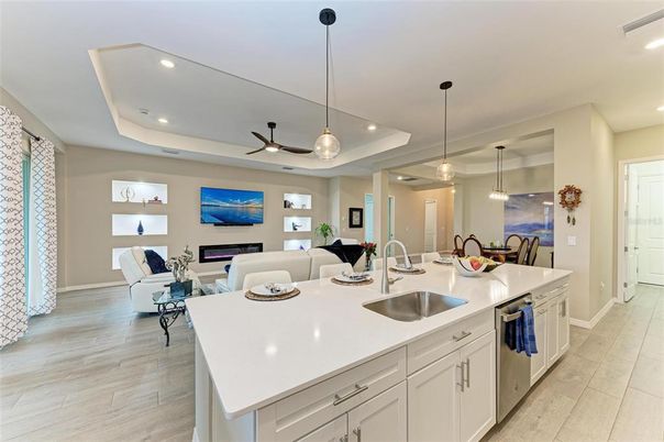 Dining room, Fireplace, Interior, Kitchen, Living room, Pendant Lights, Recessed Lighting, Wood Texture Flooring