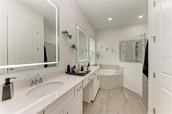 Bathroom, Dual Sink Vanities, Glass Shower, Interior, Recessed Lighting, Wood Texture Flooring