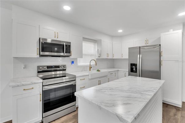 Interior, Kitchen, Recessed Lighting, Stainless Steel Appliances, Wood Texture Flooring