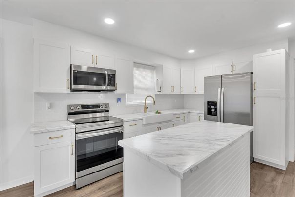 Interior, Kitchen, Recessed Lighting, Stainless Steel Appliances, Wood Texture Flooring