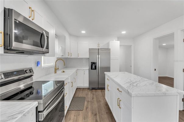 Interior, Kitchen, Recessed Lighting, Stainless Steel Appliances, Wood Texture Flooring