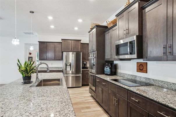Interior, Kitchen, Pendant Lights, Recessed Lighting, Stainless Steel Appliances, Wood Texture Flooring