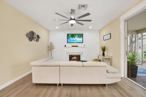 Fireplace, Interior, Living room, Recessed Lighting, Wood Texture Flooring