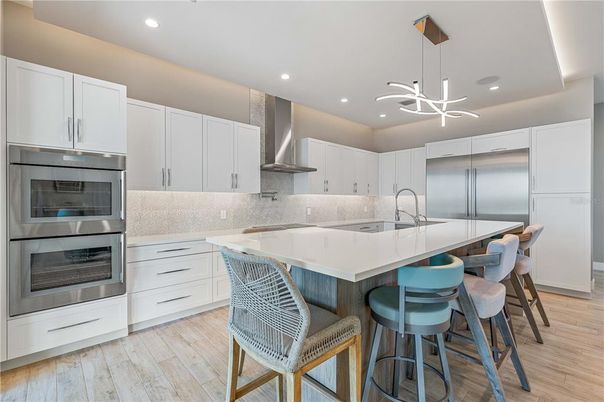 Interior, Kitchen, Pendant Lights, Recessed Lighting, Stainless Steel Appliances, Wood Texture Flooring