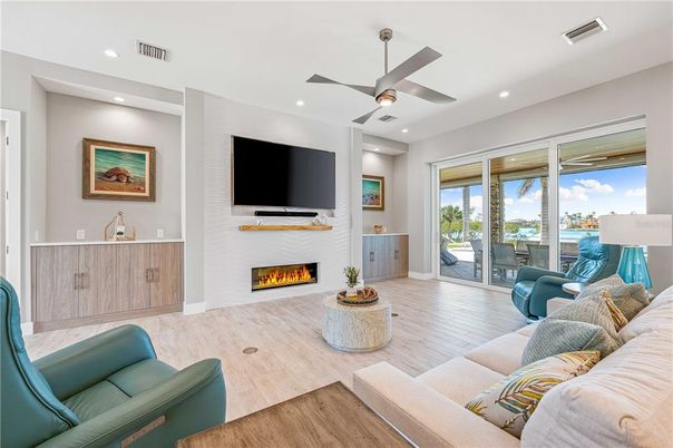 Fireplace, Interior, Living room, Recessed Lighting, Wood Texture Flooring