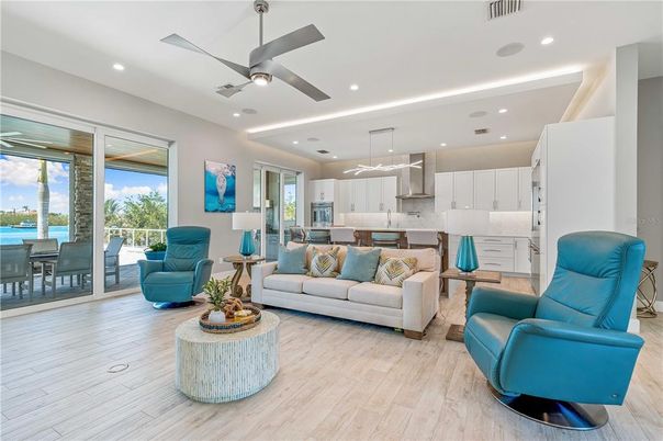 Dining room, Interior, Kitchen, Living room, Pendant Lights, Recessed Lighting, Stainless Steel Appliances, Wood Texture Flooring