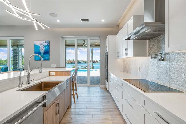 Interior, Kitchen, Recessed Lighting, Stainless Steel Appliances, Water, Wood Texture Flooring