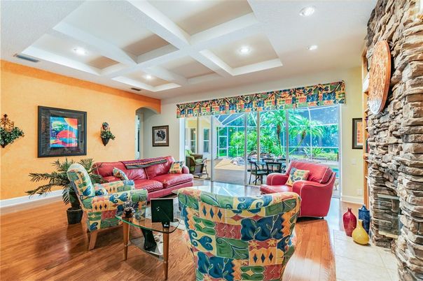 Fireplace, Interior, Living room, Recessed Lighting, Stone Walls, Wood Texture Flooring