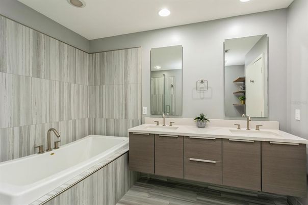 Bathroom, Dual Sink Vanities, Interior, Recessed Lighting, Wood Texture Flooring