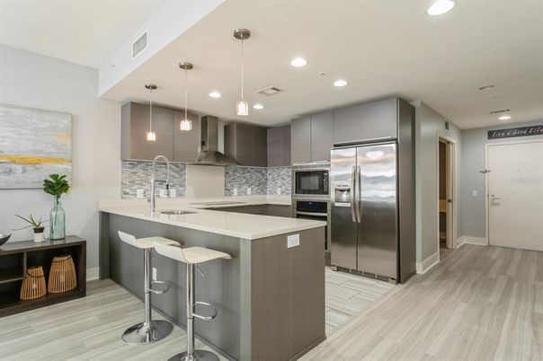 Interior, Kitchen, Pendant Lights, Recessed Lighting, Stainless Steel Appliances, Wood Texture Flooring