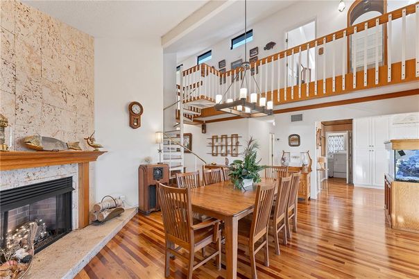 Dining room, Fireplace, Interior, Pendant Lights, Wood Texture Flooring