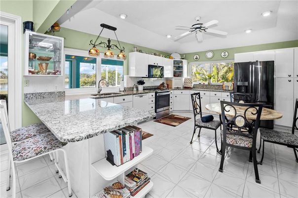 Dining room, Interior, Kitchen, Marble, Pendant Lights, Recessed Lighting, Stainless Steel Appliances
